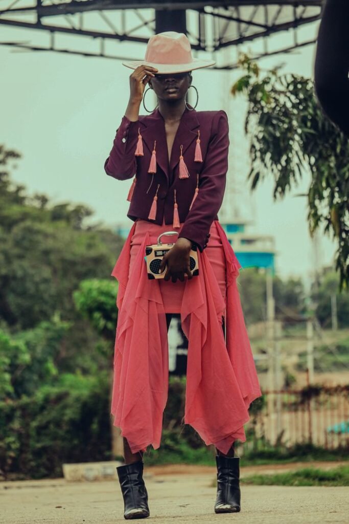Trendy outfit featuring pink hat and skirt, perfect for fashion inspiration.